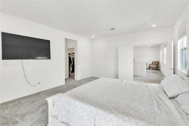 1596 Pacific Baza St, Las Vegas, NV 89138 - bedroom featuring light colored carpet, a walk in closet, and recessed lighting