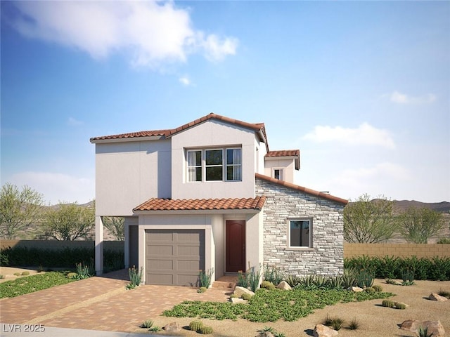 1808 Mangrove Ct, Las Vegas, NV 89138 - mediterranean / spanish house with a tiled roof, decorative driveway, stucco siding, and an attached garage