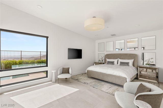 826 Bolide St, Las Vegas, NV 89138 - bedroom featuring baseboards and vaulted ceiling
