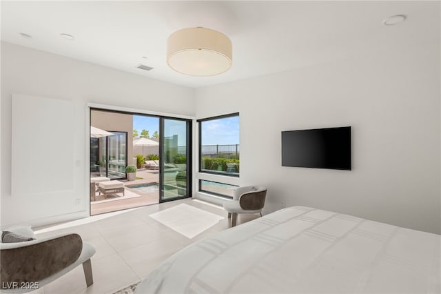 826 Bolide St, Las Vegas, NV 89138 - bedroom featuring access to exterior and tile patterned flooring