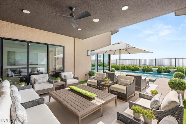 826 Bolide St, Las Vegas, NV 89138 - view of patio featuring a ceiling fan and an outdoor living space