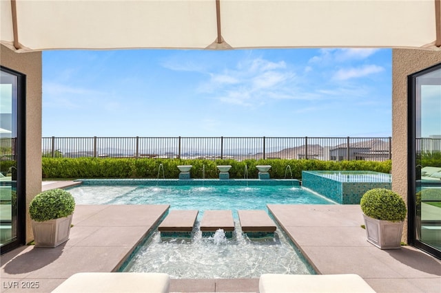 826 Bolide St, Las Vegas, NV 89138 - view of pool with a pool with connected hot tub and a fenced backyard