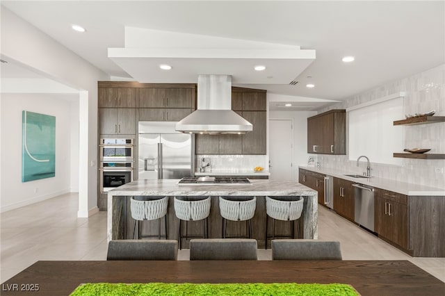 826 Bolide St, Las Vegas, NV 89138 - kitchen with wall chimney exhaust hood, stainless steel appliances, a sink, open shelves, and tasteful backsplash