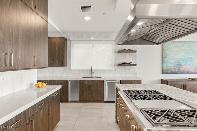 826 Bolide St, Las Vegas, NV 89138 - kitchen featuring wall chimney range hood, stainless steel dishwasher, a sink, light countertops, and tasteful backsplash