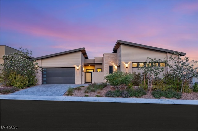 826 Bolide St, Las Vegas, NV 89138 - view of front facade featuring a garage and driveway