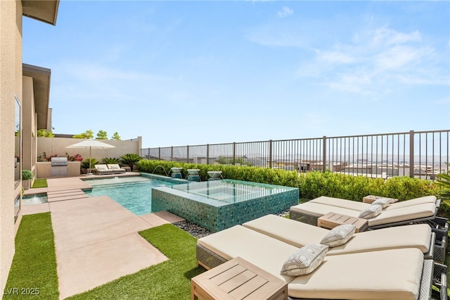 826 Bolide St, Las Vegas, NV 89138 - view of swimming pool with a fenced backyard, a pool with connected hot tub, and a patio