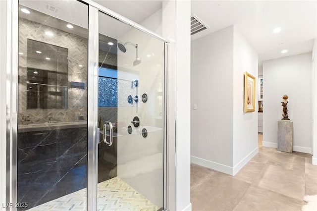 358 Solitude Peak Ln, Henderson, NV 89012 - full bathroom with recessed lighting, baseboards, a stall shower, and concrete floors