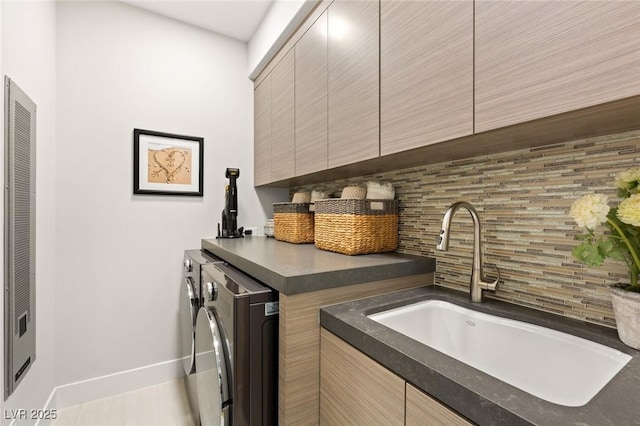 358 Solitude Peak Ln, Henderson, NV 89012 - laundry area featuring cabinet space, washer and dryer, baseboards, and a heating unit