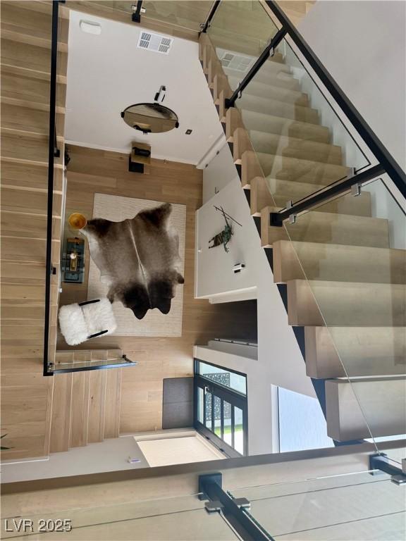 358 Solitude Peak Ln, Henderson, NV 89012 - staircase featuring wooden walls