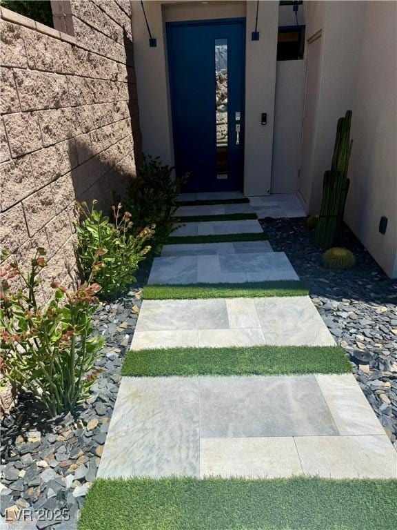 358 Solitude Peak Ln, Henderson, NV 89012 - entrance to property with stucco siding and elevator