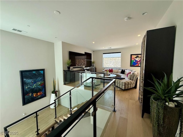 358 Solitude Peak Ln, Henderson, NV 89012 - hallway featuring light wood finished floors and recessed lighting
