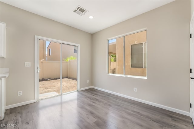 6260 Castle Kennedy St, Henderson, NV 89011 - empty room featuring baseboards, wood finished floors, and recessed lighting