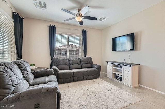 8490 Classique Ave Unit 101, Las Vegas, NV 89178 - living area with a ceiling fan and baseboards