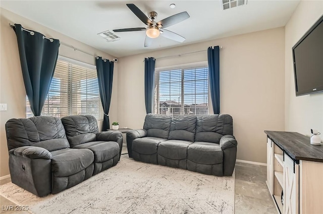 8490 Classique Ave Unit 101, Las Vegas, NV 89178 - living area featuring baseboards, ceiling fan, and healthy amount of natural light
