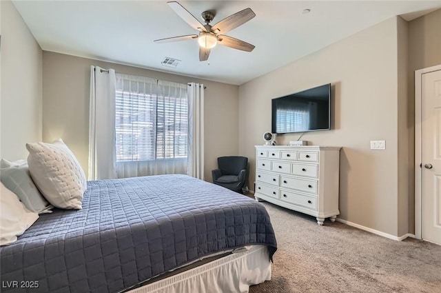 8490 Classique Ave Unit 101, Las Vegas, NV 89178 - carpeted bedroom featuring baseboards and a ceiling fan
