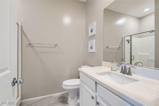 8490 Classique Ave Unit 101, Las Vegas, NV 89178 - bathroom featuring vanity, toilet, a shower stall, baseboards, and tile patterned flooring