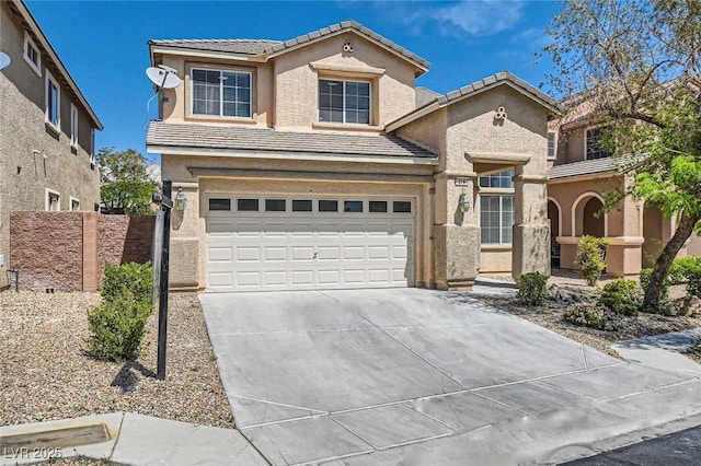 216 Sharp Edge Ave, North Las Vegas, NV 89031 - view of front of property with driveway, stucco siding, a tiled roof, and a garage