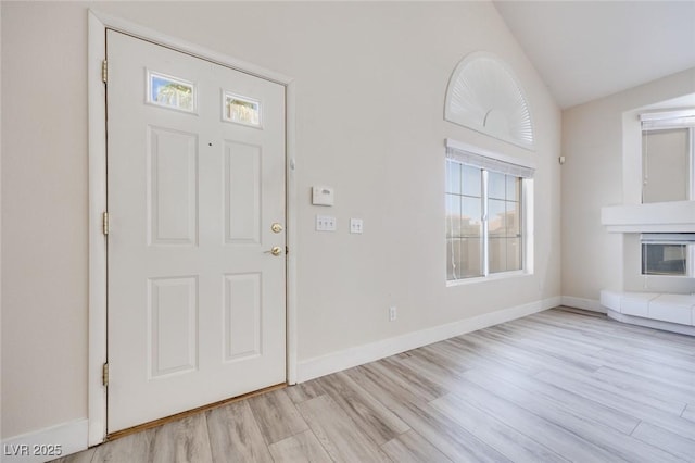 1551 Echo Falls Ave, Las Vegas, NV 89183 - entrance foyer featuring vaulted ceiling, wood finished floors, and baseboards