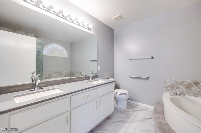 1551 Echo Falls Ave, Las Vegas, NV 89183 - bathroom with double vanity, a bath, marble finish floors, and toilet