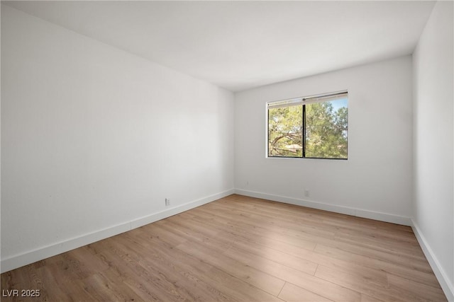 3151 Soaring Gulls Dr Unit 2121, Las Vegas, NV 89128 - unfurnished room with light wood-type flooring and baseboards