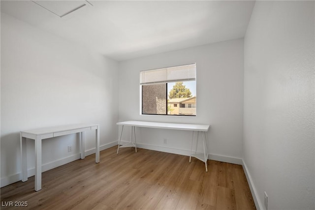 3151 Soaring Gulls Dr Unit 2121, Las Vegas, NV 89128 - spare room featuring wood finished floors and baseboards