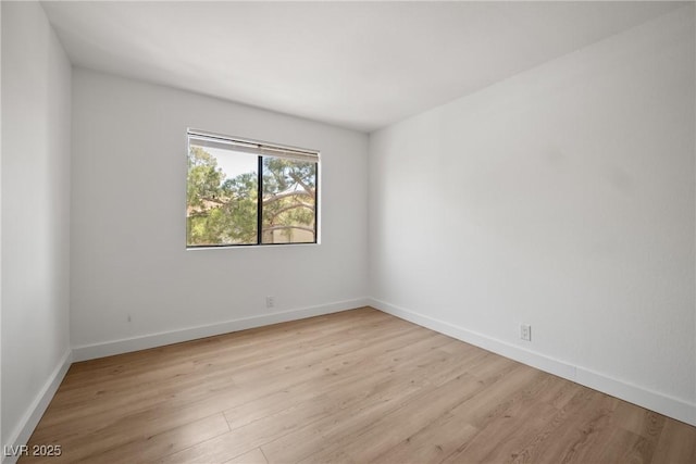 3151 Soaring Gulls Dr Unit 2121, Las Vegas, NV 89128 - unfurnished room featuring light wood finished floors and baseboards