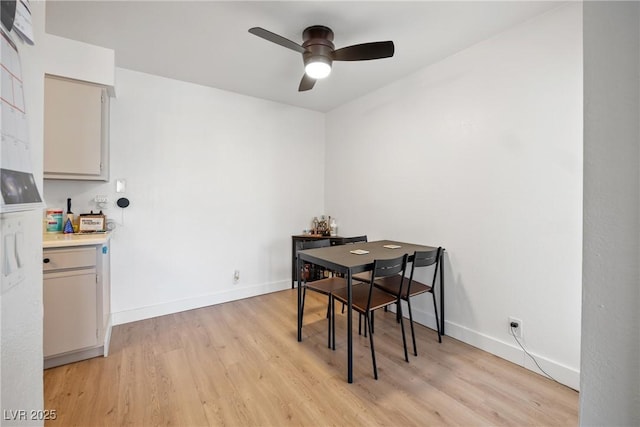 3151 Soaring Gulls Dr Unit 2121, Las Vegas, NV 89128 - dining room with a ceiling fan, light wood-type flooring, and baseboards
