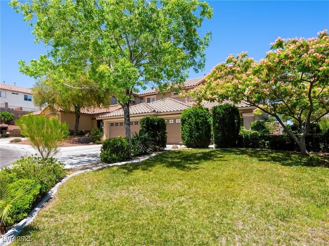 10612 Gum Tree Ct, Las Vegas, NV 89144 - view of front of house featuring a tile roof, stucco siding, a garage, a front lawn, and concrete driveway