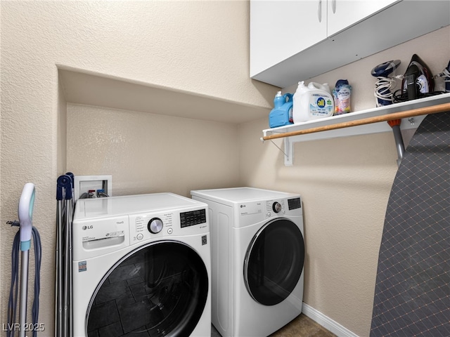 10612 Gum Tree Ct, Las Vegas, NV 89144 - laundry room featuring washer and dryer and cabinet space