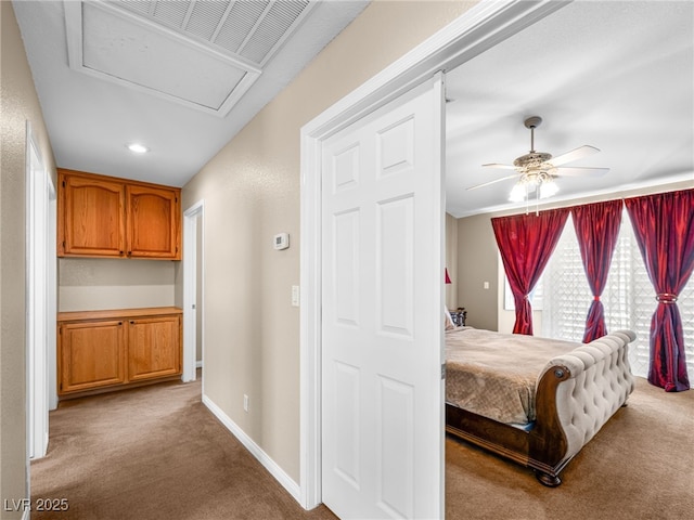 10612 Gum Tree Ct, Las Vegas, NV 89144 - carpeted bedroom featuring attic access, baseboards, and a ceiling fan