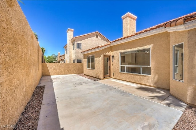 2117 Desert Peak Rd, Las Vegas, NV 89134 - fenced backyard featuring a patio area