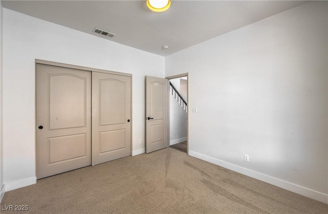 2117 Desert Peak Rd, Las Vegas, NV 89134 - unfurnished bedroom featuring carpet flooring and a closet