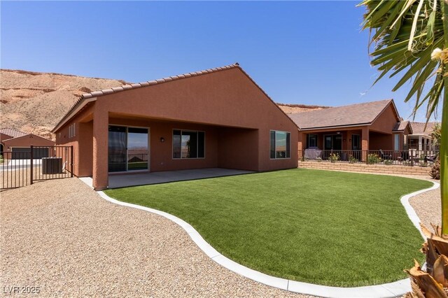 1398 Pin Cushion Rdg, Mesquite, NV 89034 - back of house with stucco siding and a patio area