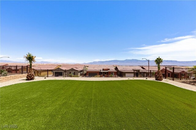1398 Pin Cushion Rdg, Mesquite, NV 89034 - fenced backyard featuring a mountain view