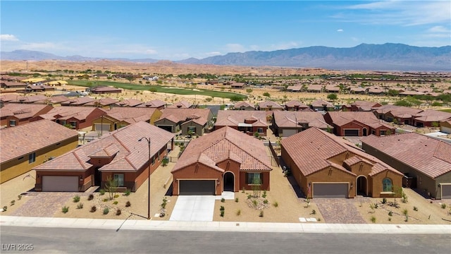1398 Pin Cushion Rdg, Mesquite, NV 89034 - aerial perspective of suburban area featuring a mountainous background