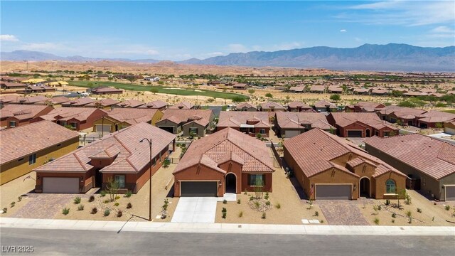 1398 Pin Cushion Rdg, Mesquite, NV 89034 - aerial perspective of suburban area featuring a mountainous background