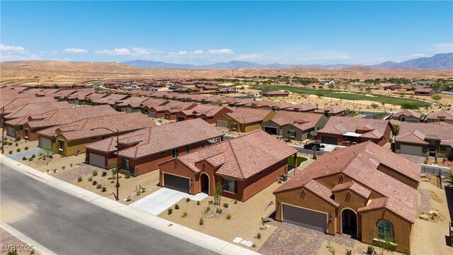 1398 Pin Cushion Rdg, Mesquite, NV 89034 - aerial view of residential area featuring a mountainous background