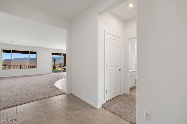 1398 Pin Cushion Rdg, Mesquite, NV 89034 - hall with light carpet, light tile patterned floors, and recessed lighting