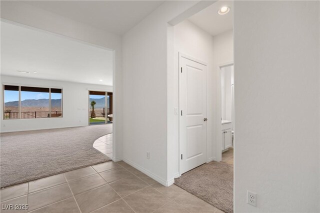 1398 Pin Cushion Rdg, Mesquite, NV 89034 - hall with light carpet, light tile patterned floors, and recessed lighting
