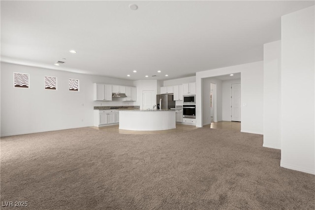1398 Pin Cushion Rdg, Mesquite, NV 89034 - unfurnished living room with recessed lighting and light colored carpet