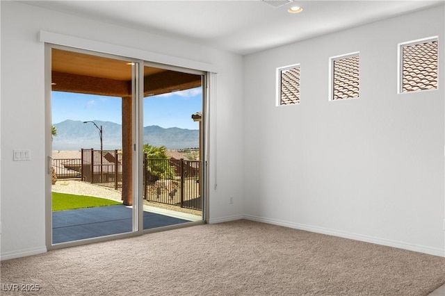 1398 Pin Cushion Rdg, Mesquite, NV 89034 - carpeted spare room with a mountain view and recessed lighting