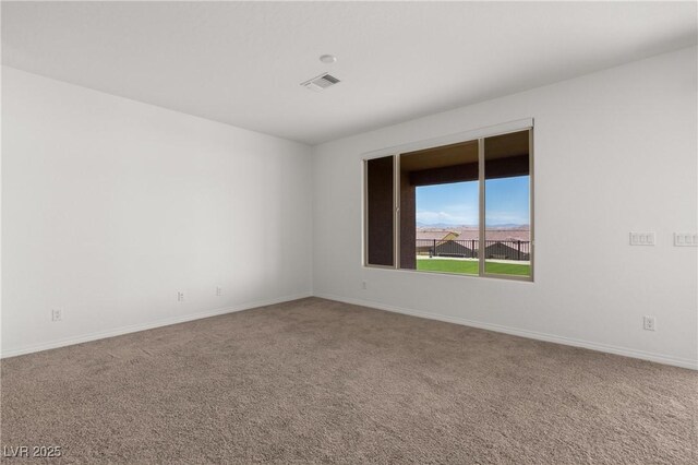 1398 Pin Cushion Rdg, Mesquite, NV 89034 - carpeted spare room with baseboards