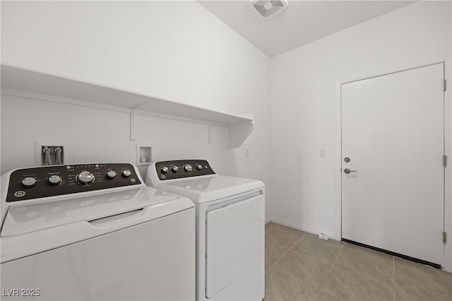 1398 Pin Cushion Rdg, Mesquite, NV 89034 - laundry area with separate washer and dryer and light tile patterned floors
