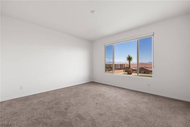 1398 Pin Cushion Rdg, Mesquite, NV 89034 - spare room with carpet flooring and baseboards