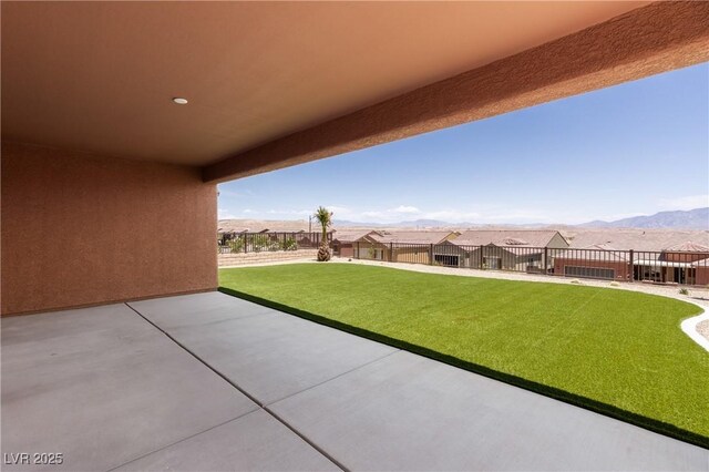 1398 Pin Cushion Rdg, Mesquite, NV 89034 - fenced backyard with a patio area, a mountain view, and a residential view