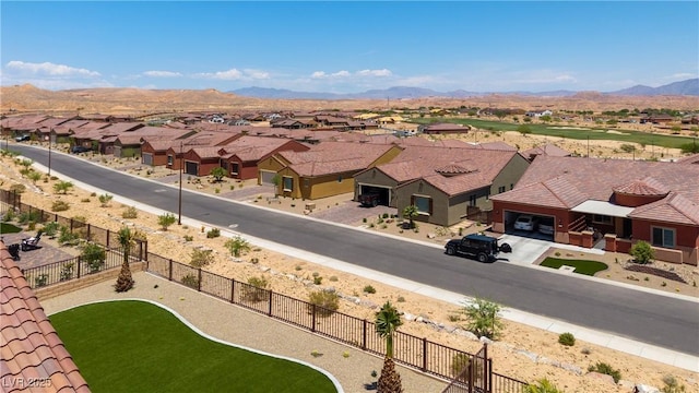 1398 Pin Cushion Rdg, Mesquite, NV 89034 - aerial perspective of suburban area featuring a mountain backdrop