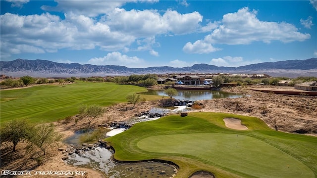 1398 Pin Cushion Rdg, Mesquite, NV 89034 - view of property's community featuring golf course view, an area to practice putting, and a water and mountain view