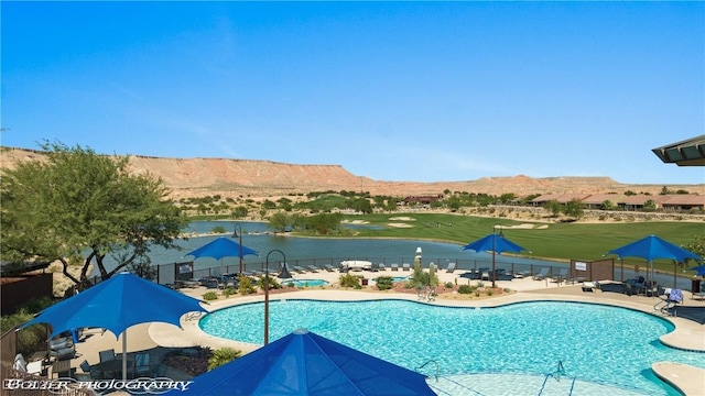 1398 Pin Cushion Rdg, Mesquite, NV 89034 - community pool featuring a patio and a water and mountain view