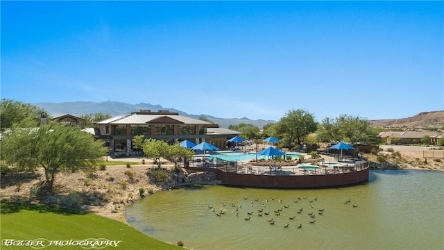 1398 Pin Cushion Rdg, Mesquite, NV 89034 - dock area featuring a community pool and a water and mountain view