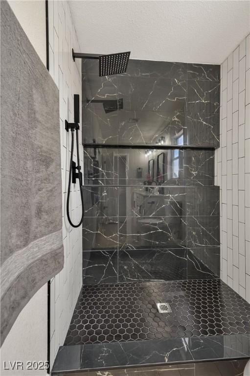 6388 Canyon Dawn Ave, Las Vegas, NV 89108 - bathroom with a marble finish shower